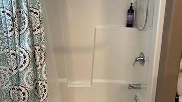 Hair dryer, towels, soap, toilet paper
