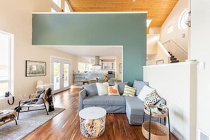 Smart TV, fireplace, books, printers