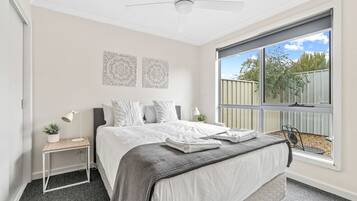 1 bedroom, desk, iron/ironing board, travel cot