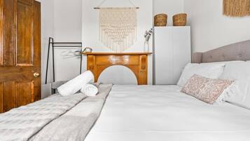 3 bedrooms, desk, iron/ironing board, travel cot