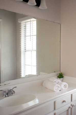 Hair dryer, towels, soap, toilet paper