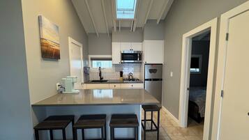 Microwave, stovetop, coffee/tea maker, toaster