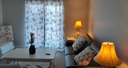 Executive 2BR Apartment | Walk to Hospitals | In-Unit Gym + Wi-Fi