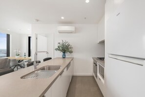Suite, 3 Bedrooms, City View | Private kitchen