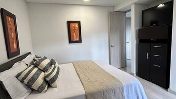 2 bedrooms, desk, iron/ironing board, travel crib