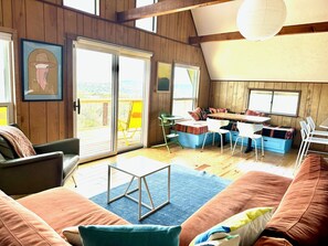 TV, fireplace - Design-forward Frio cabin with epic views & pool (Concan)