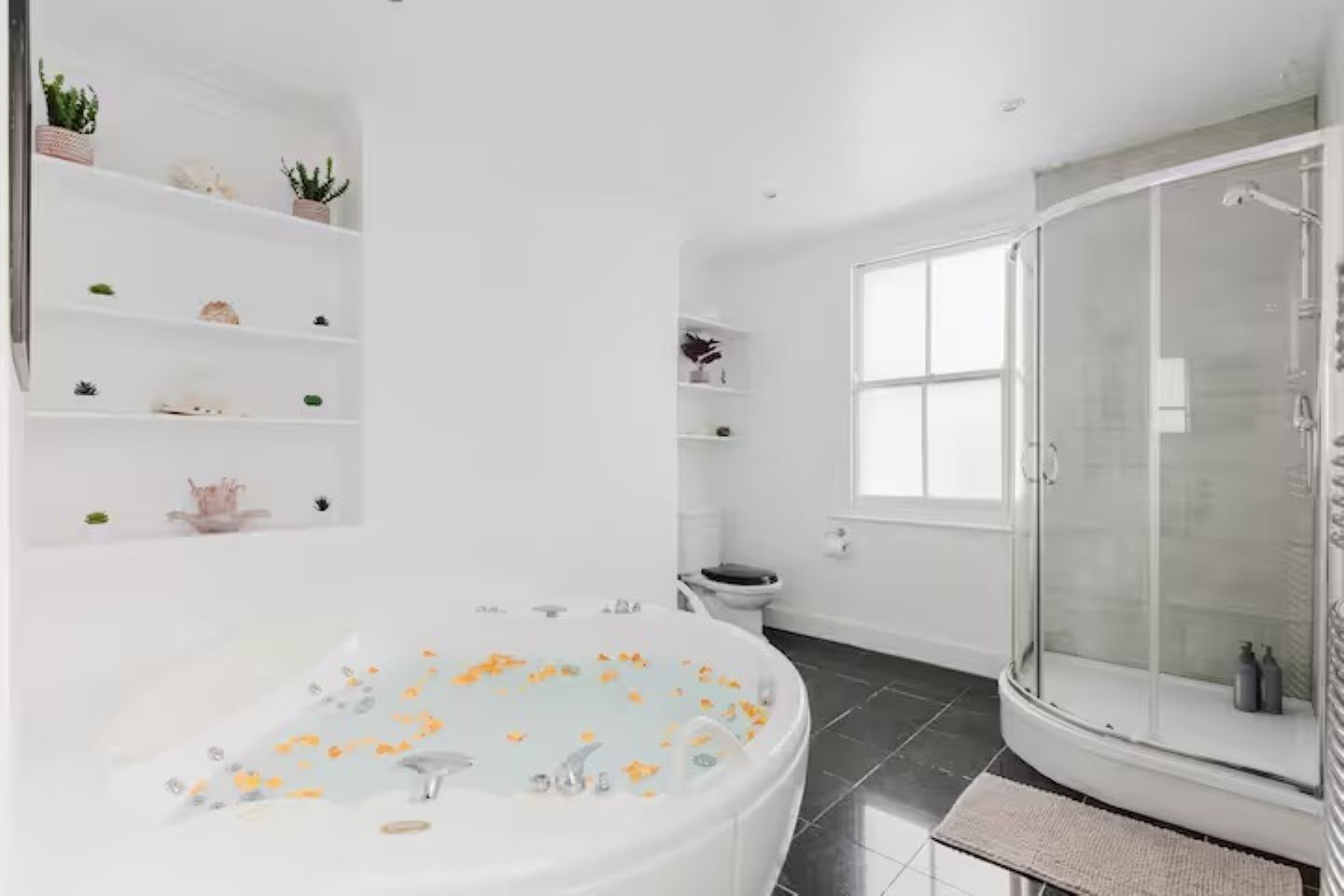 Shower, jetted bath, hair dryer, towels