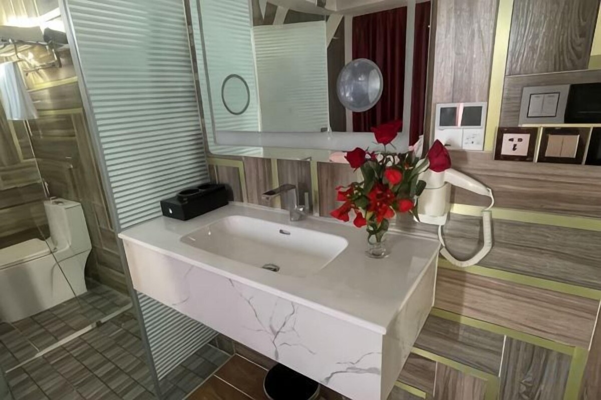 Bathroom | Shower, rainfall showerhead, designer toiletries, hair dryer