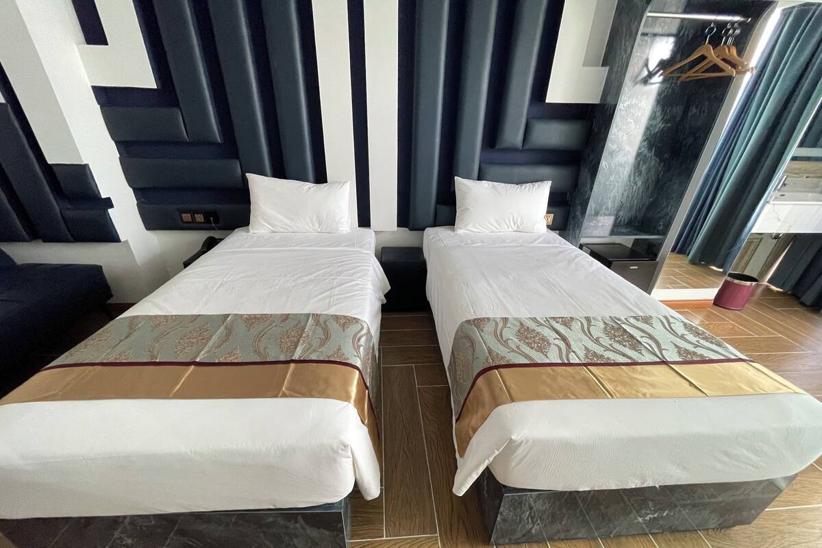 Deluxe Double or Twin Room, City View | Premium bedding, minibar, in-room safe, desk