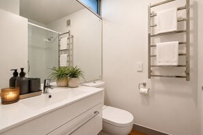 Shower, hair dryer, towels, soap