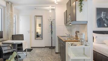 Fridge, microwave, stovetop, coffee/tea maker