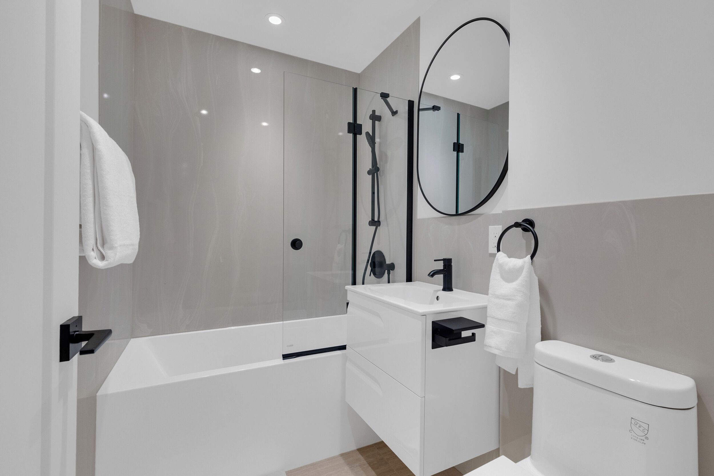 Deluxe Condo, Balcony | Bathroom | Combined shower/bathtub, hair dryer, towels, soap