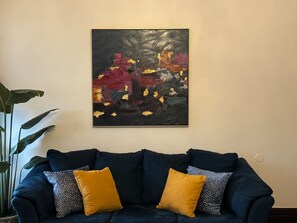 TV, fireplace, books