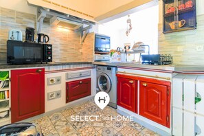 Fridge, dishwasher, toaster, cookware/dishes/utensils