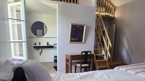A bedroom with a bunk bed, a desk, a chair, a ladder, a mirror, and a framed picture on the wall. - Gîte du Clos du Parc, in the heart of the farm (CHINON)