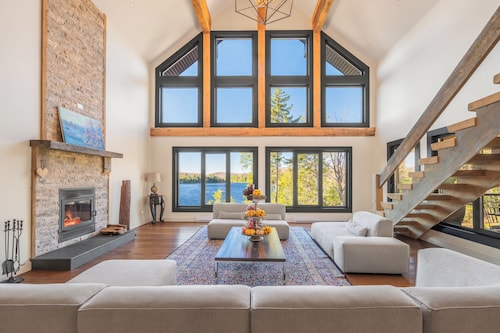  lakefront cottage is where comfort meets nature in perfect harmony.