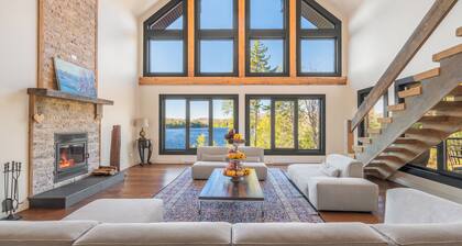 lakefront cottage is where comfort meets nature in perfect harmony.