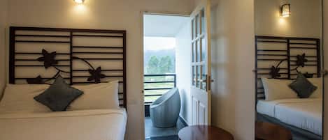 Habitación familiar | Ropa de cama de alta calidad y caja de seguridad en la habitación