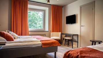 Desk, blackout drapes, soundproofing, free WiFi