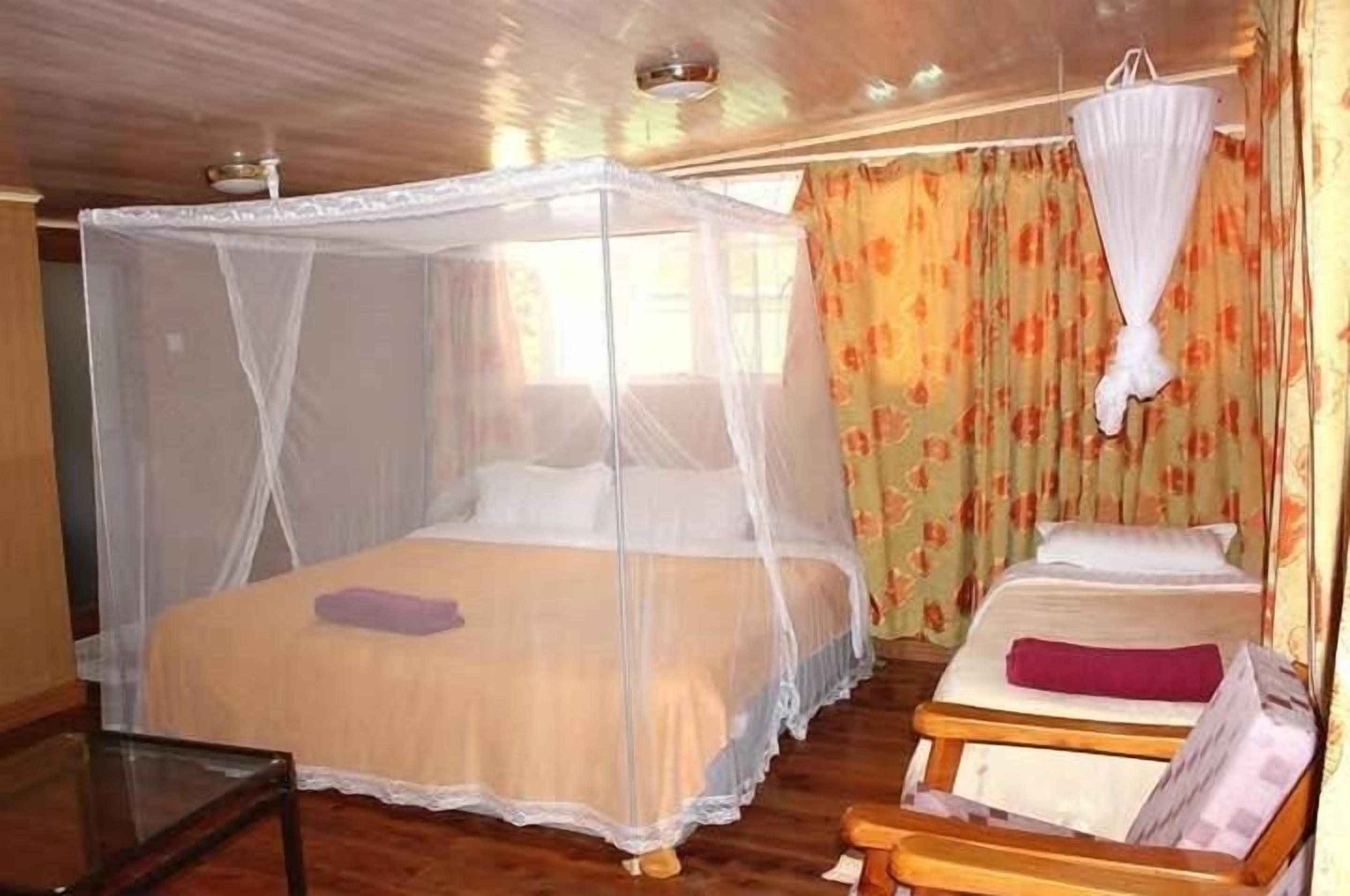 Classic Double Room, Garden View | Desk, laptop workspace, iron/ironing board, free WiFi