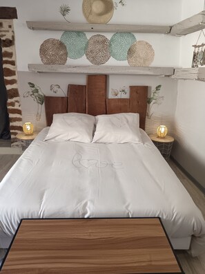 2 habitaciones, tabla de planchar con plancha y cuna de viaje 