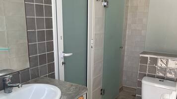 Shower, towels, soap, toilet paper