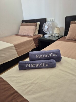2 habitaciones, tabla de planchar con plancha, wifi y ropa de cama