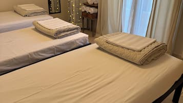 Luxury Apartment, Balcony, Garden View | 2 bedrooms, blackout drapes, soundproofing, iron/ironing board