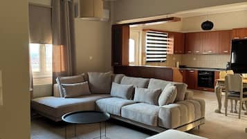 Luxury Apartment, Balcony, Garden View | Living area