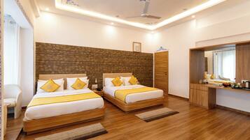 Family Room | Premium bedding, down duvets, desk, laptop workspace