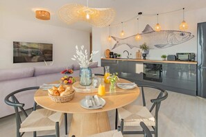 Dining - Vacation apartment Blaubarschbude - Modern Blaubarschbude with balcony - only 800 m to the (Loddin)