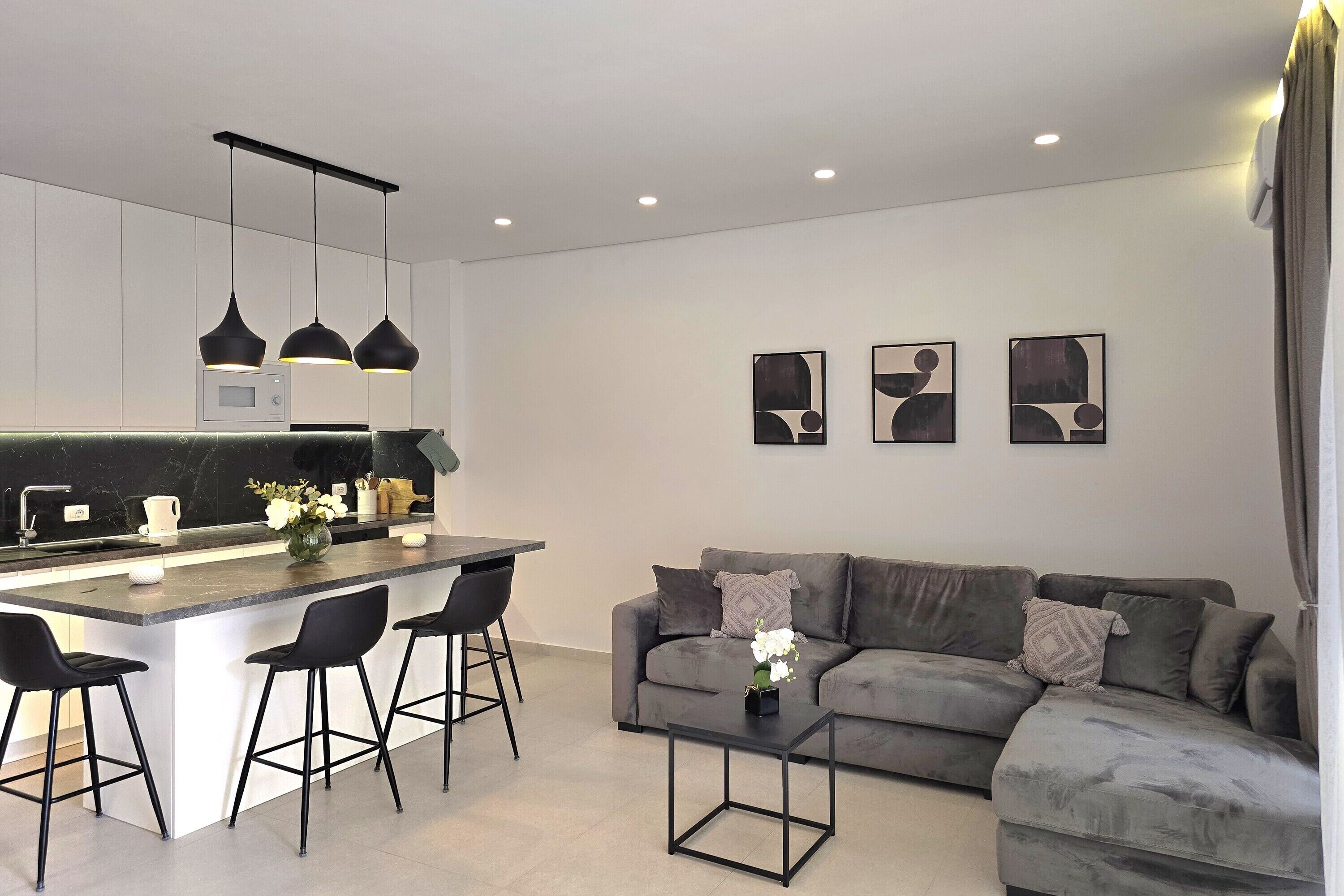 Family Apartment, Multiple Bedrooms (SanPietro Holiday Homes 287) | Living area | 32-inch Smart TV with cable channels