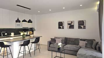 Family Apartment, Multiple Bedrooms (SanPietro Holiday Homes 287) | Living area | 32-inch Smart TV with cable channels