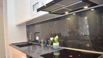 Family Apartment, Multiple Bedrooms (SanPietro Holiday Homes 287) | Private kitchen | Fridge, oven, stovetop, dishwasher