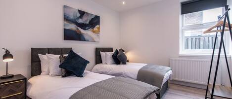 Apartamento, 2 quartos, para não fumantes | 2 quartos, ferros/tábuas de passar roupa, roupa de cama