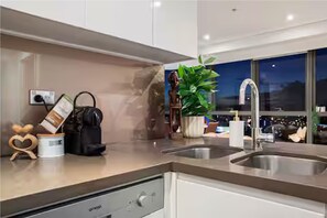 Fridge, microwave, stovetop, cookware/dishes/utensils
