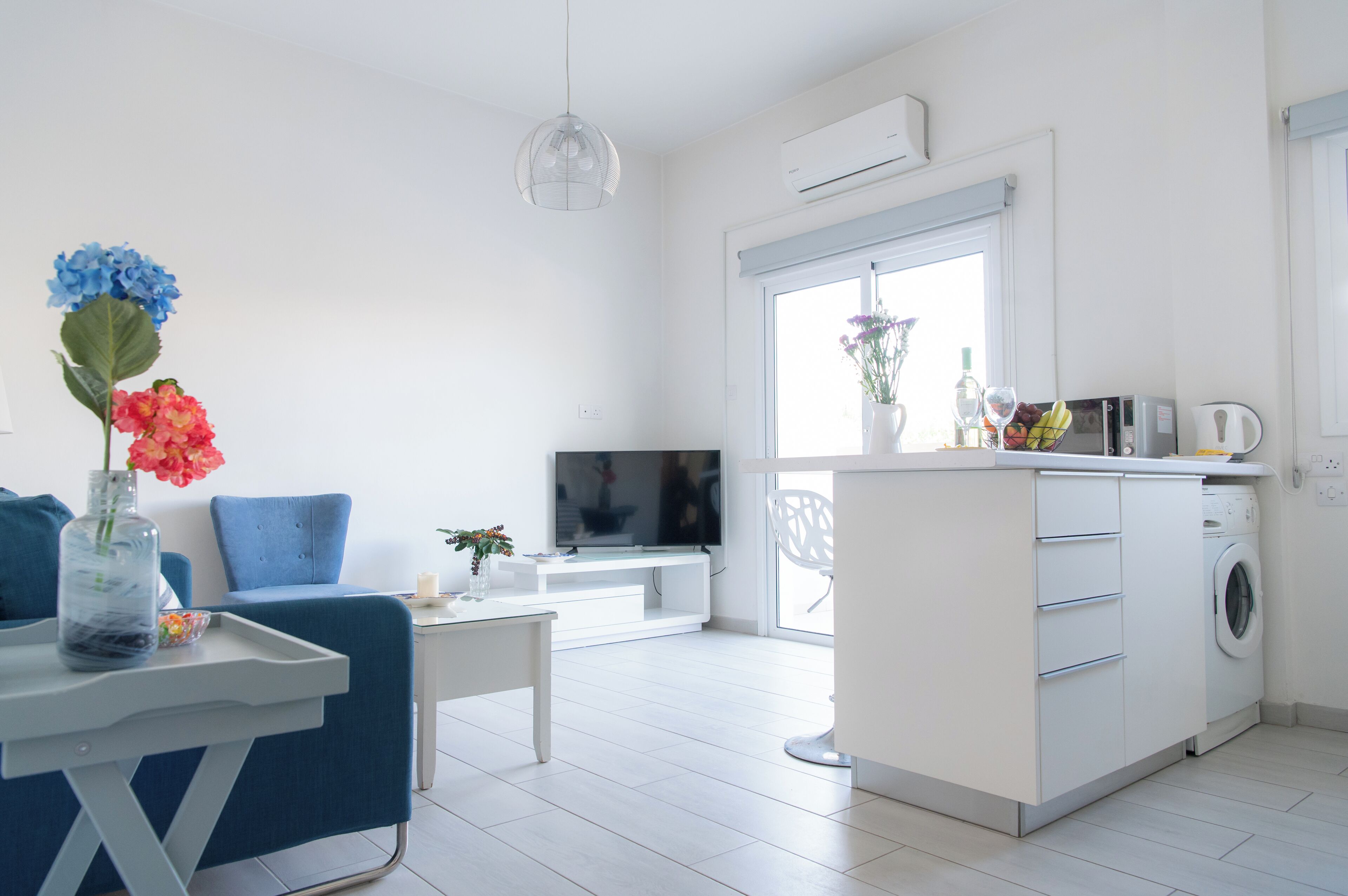 Deluxe Apartment, Garden View | In-room safe, desk, laptop workspace, blackout curtains