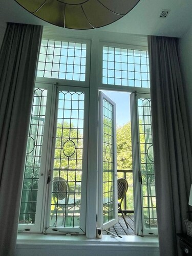 Elegant 2-Bedroom Apartment with Amstel River Views | Central Amsterdam Retreat