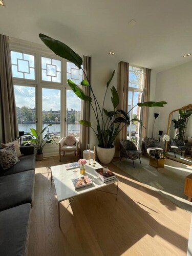 Elegant 2-Bedroom Apartment with Amstel River Views | Central Amsterdam Retreat