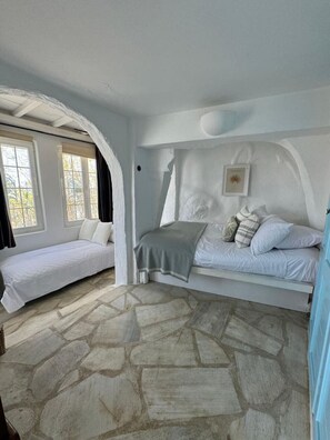 1 غرفة نوم ومكواة/لوح كي وواي فاي وملاءات أسرّة