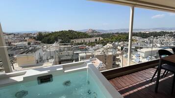 A rooftop pool with a clear view of the cityscape.