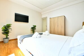 1 bedroom, desk, iron/ironing board, travel cot