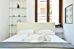 1 bedroom, desk, iron/ironing board, travel cot