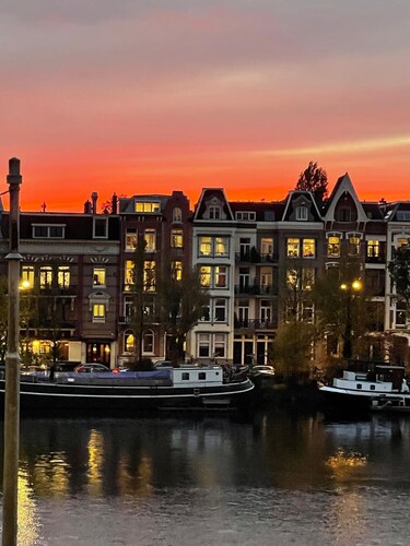 Grand Amstel Residence | Expansive Two-Story Riverfront Apartment in Central Amsterdam