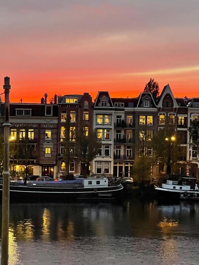 Grand Amstel Residence | Expansive Two-Story Riverfront Apartment in Central Amsterdam