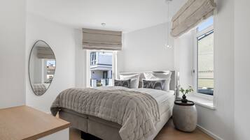 2 slaapkamers, een strijkplank/strijkijzer, reisbedje, gratis wifi