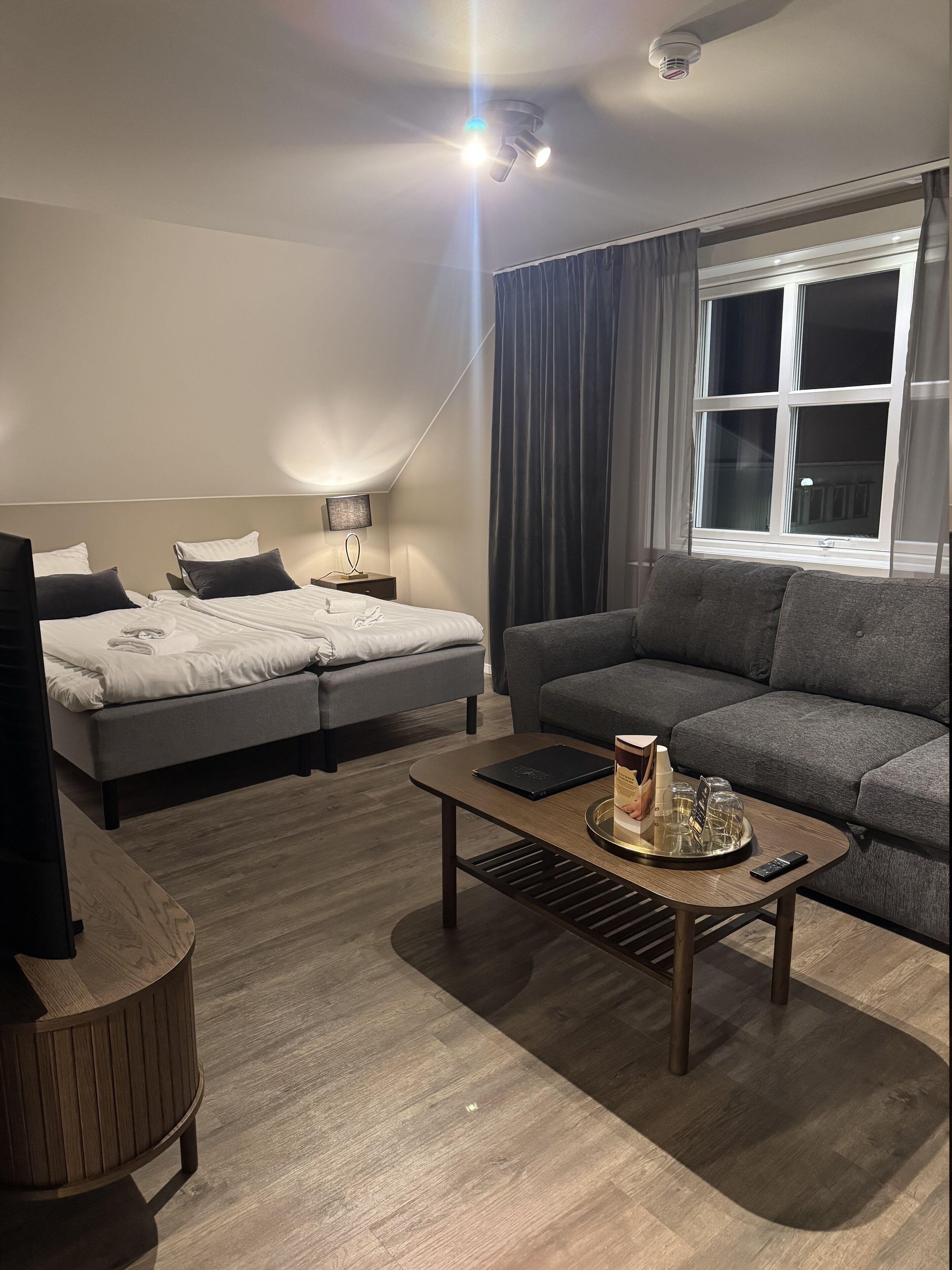 Superior Triple Room | Minibar, desk, laptop workspace, blackout drapes