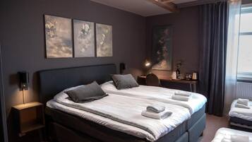 Deluxe Double Room | Minibar, desk, laptop workspace, blackout curtains