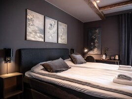 Deluxe Double Room | Minibar, desk, laptop workspace, blackout drapes