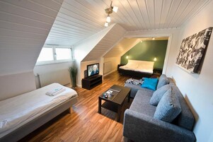 Family Room | 1 bedroom, minibar, desk, laptop workspace